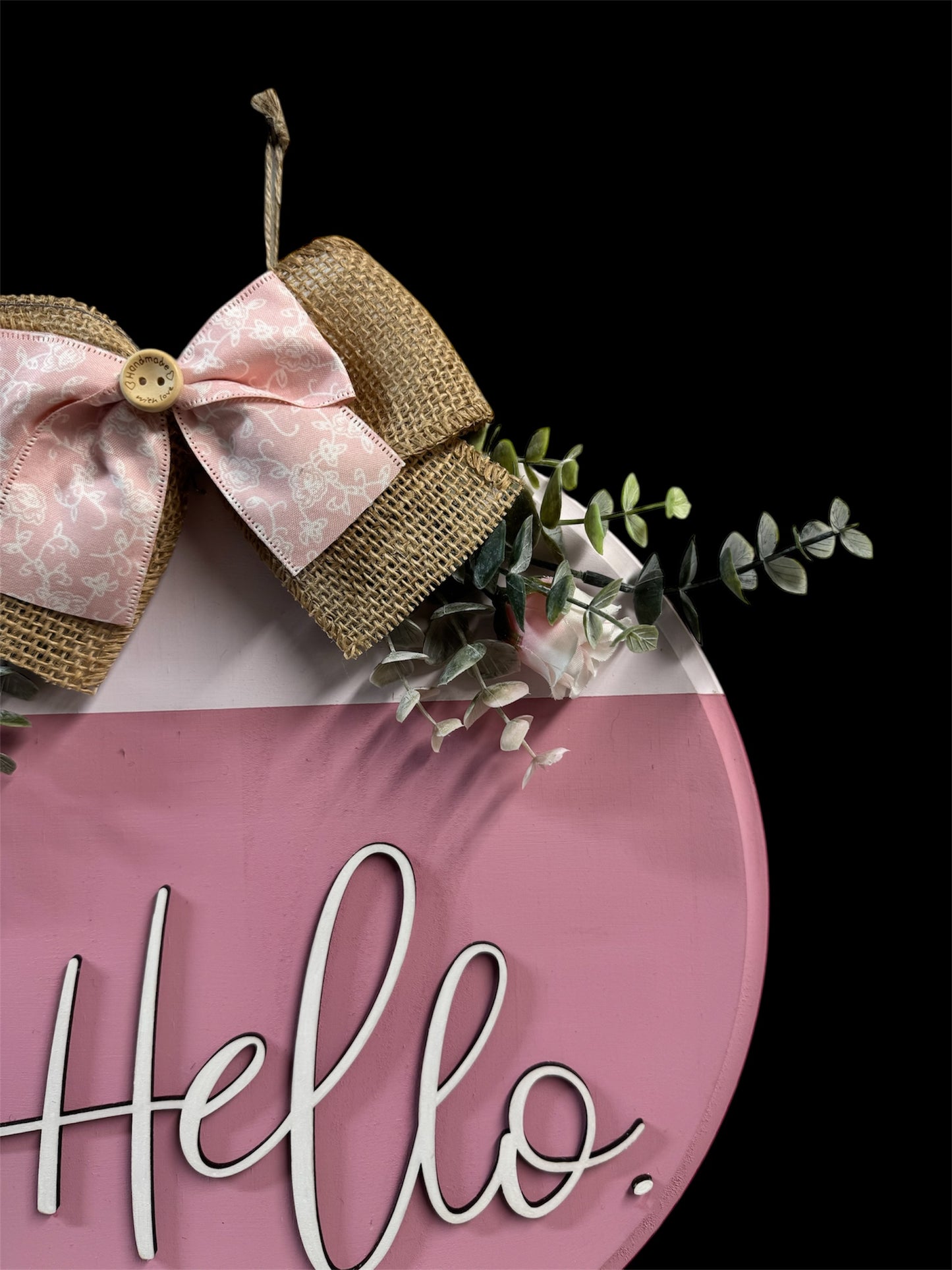 Colorful 12” Hi, Hey, Hello Door Round, hand-painted with pink roses and eucalyptus for a charming entrance.