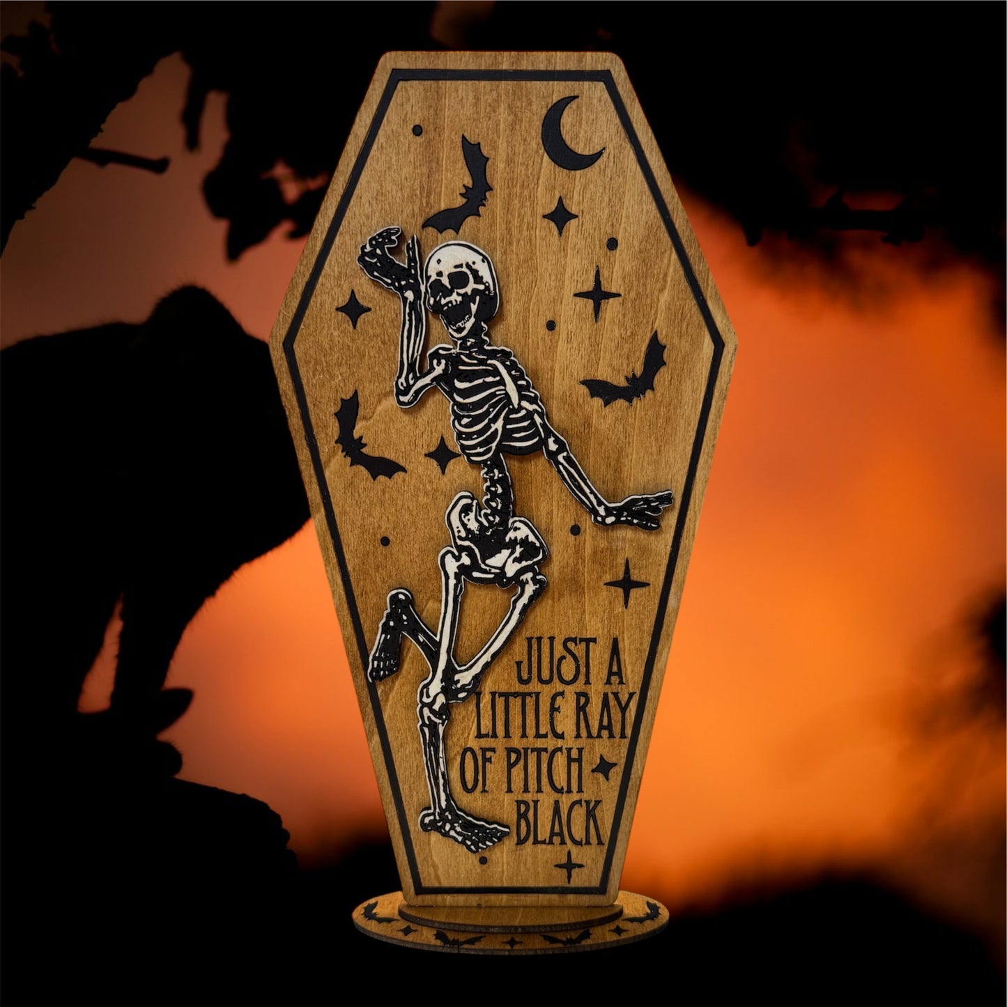 "Just A Little Ray of Pitch Black" Skeleton Coffin Sign